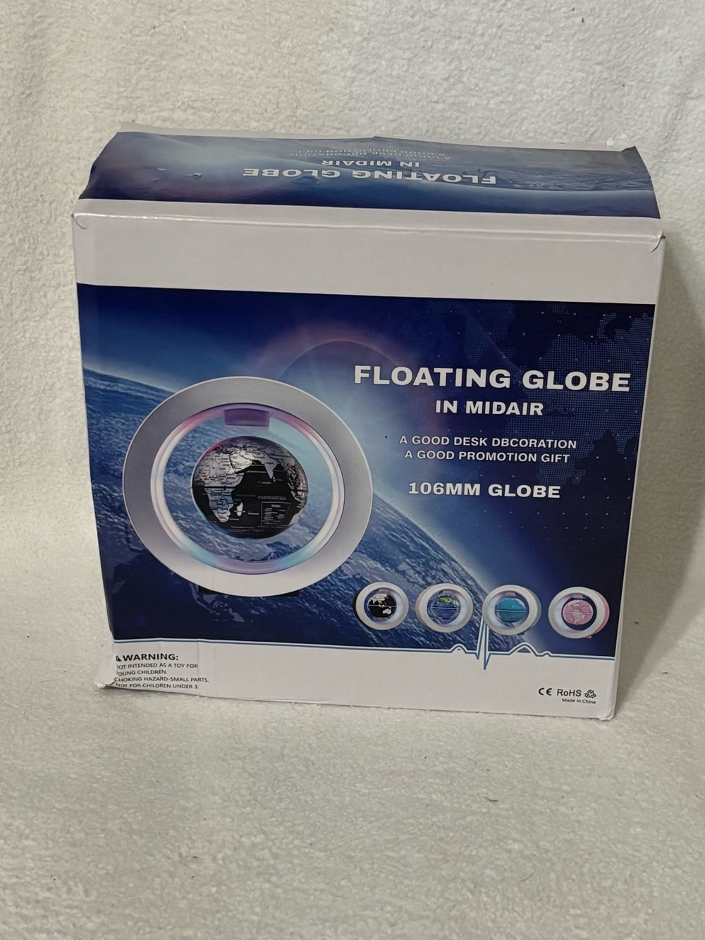 Floating Globe in Midair - White and Blue Ring